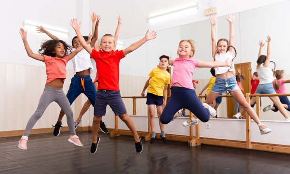 Children leaping with joy in an Encore drama class